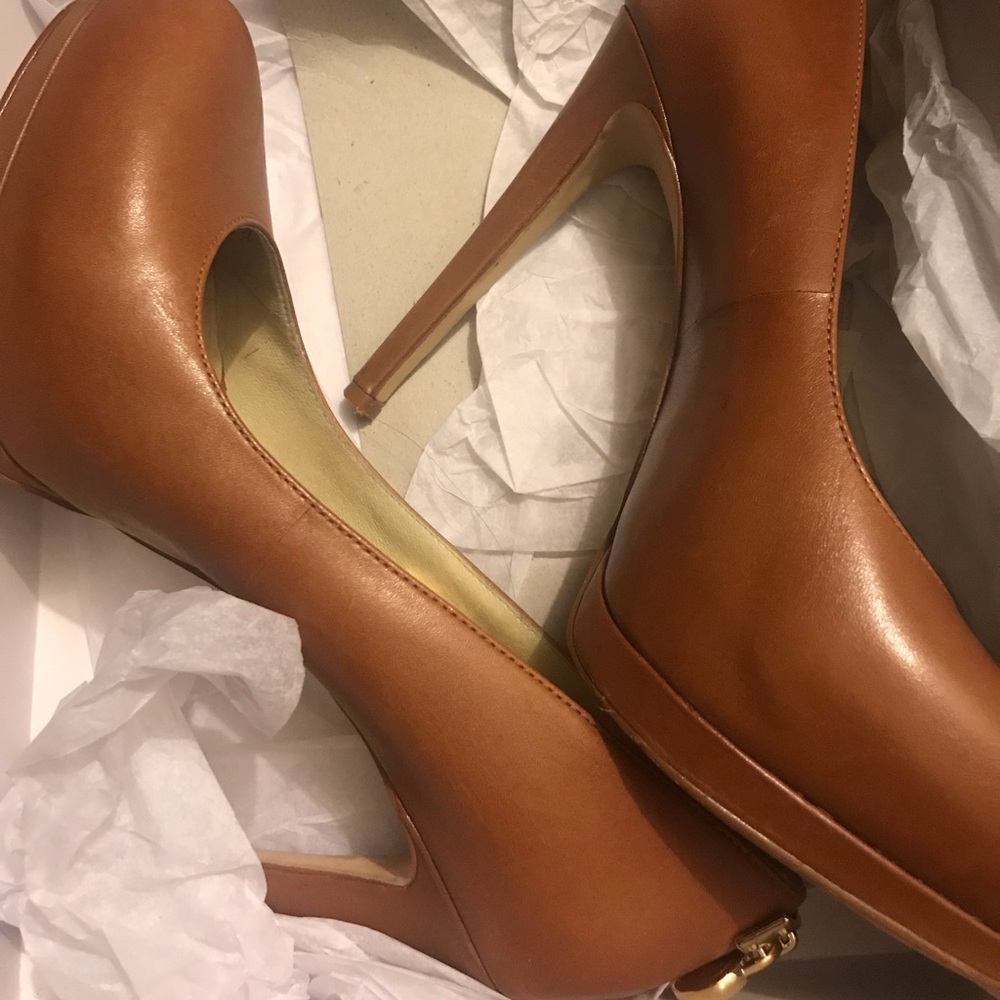 Size 7 women’s pumps by Michael Kors
